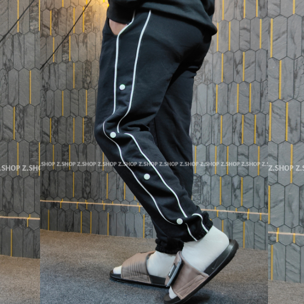 Black button joggers